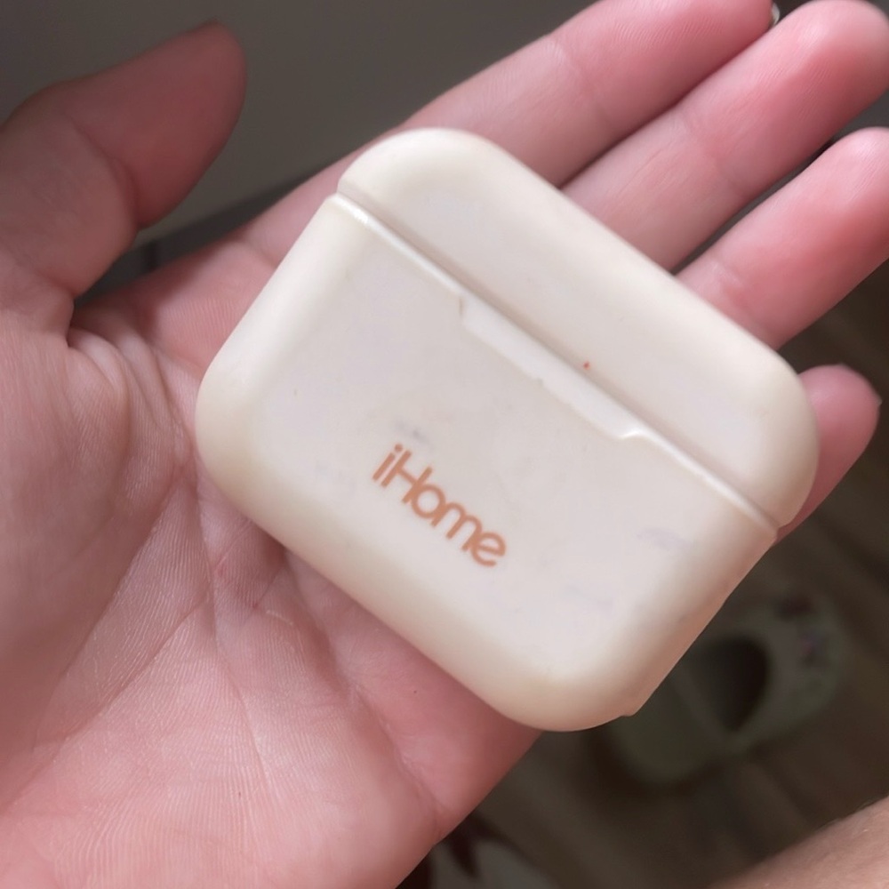 Light pink iHome wireless headphones.